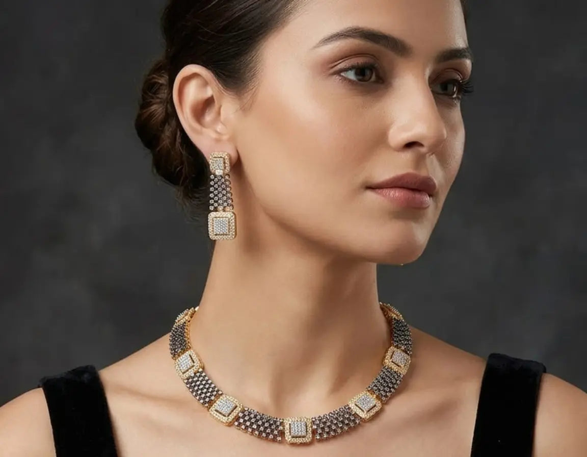 Woman wearing a necklace and earrings against a dark background